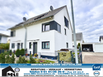 Neuwertige Doppelhaushälfte mit Stil, Komfort und schönem Garten in Erlensee-Langendiebach - Titelbild (2023)