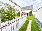 Gartenansicht - Neuwertige Doppelhaushälfte mit Stil, Komfort und schönem Garten in Erlensee-Langendiebach